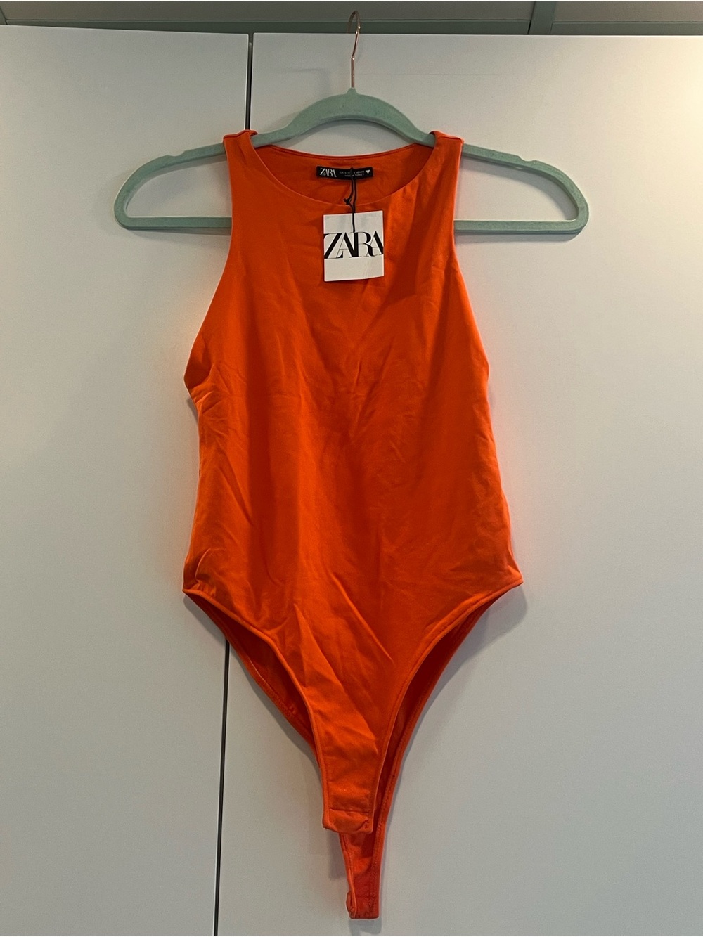 ZARA Orange One-Piece Bodysuit